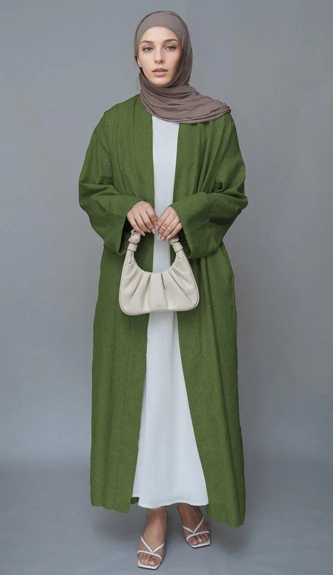 Green Lounia maxi throw over abaya in light linen fabric with a detachable belt