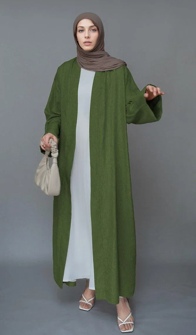 Green Lounia maxi throw over abaya in light linen fabric with a detachable belt